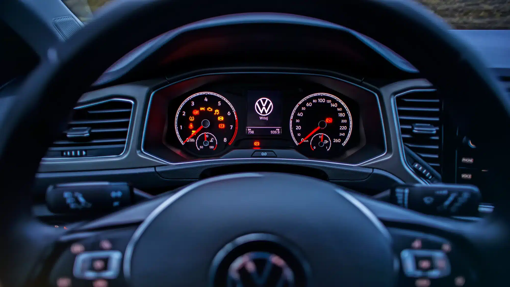 Volkswagen dashboard showing check engine light warning during vehicle diagnostics