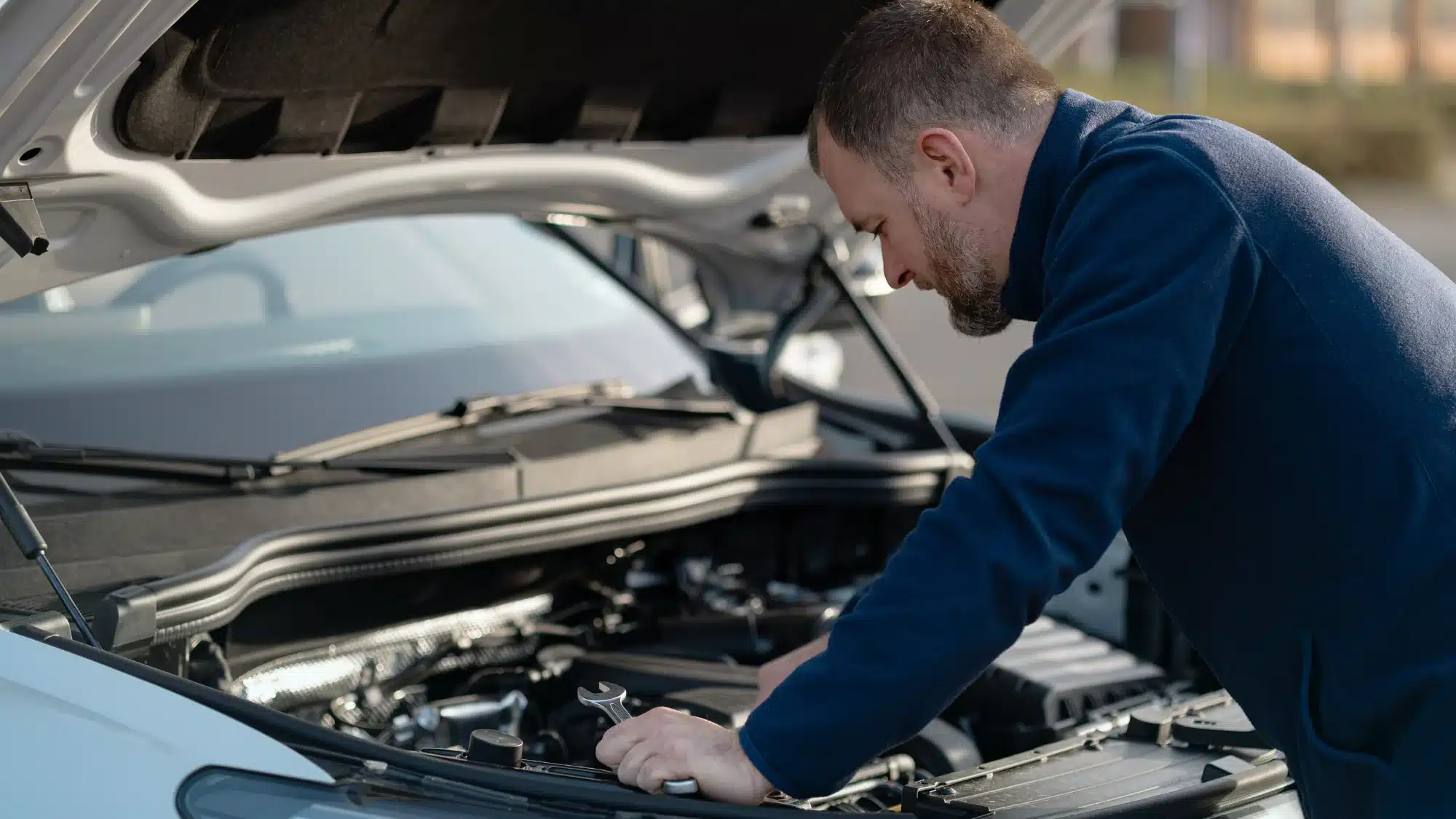 Car engine service schedule guidelines showing recommended maintenance intervals for oil changes, inspections, and engine tuning to maintain vehicle performance and reliability